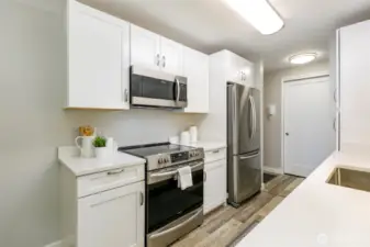 All new and top of the line stainless steel appliances.