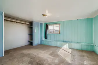 The fourth bedroom, on the lower level, offers ample opportunity for a separate sleeping space or home office.