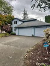 3 Car Garage and large driveway.
