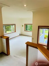 View from primary bathroom to bedroom.
