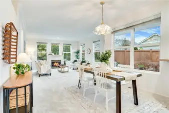 Open up the windows and let the light in! The 9' ceilings, walls and windows, new carpet and thoughtfully cared for space makes the home warm and inviting.