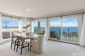 The dining area opens to the covered deck.