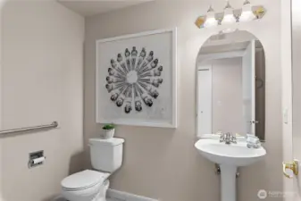 The second full bathroom is spacious and includes a shower/tub.