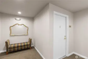 The interior entrance to the condo from the elevator.