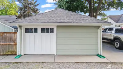 The single car door is by design as the remaining garage space is currently being used as a recreation/work space.
