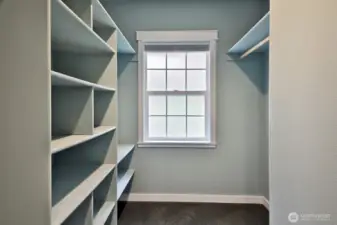 Custom shelving and space to organize your wardrobe.