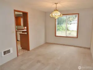Dining Room, which leads into the Kitchen.