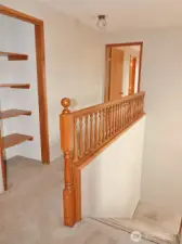 Top of the staircase landing.