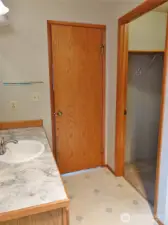 Master Bathroom w/ a walk-in closet.