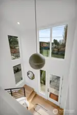 Staircase to 4 upper bedrooms.