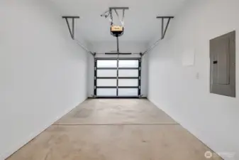 One car garage with EV charging.