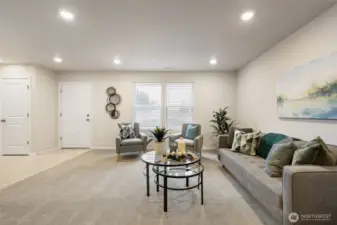 Great room area, open to kitchen and dining.