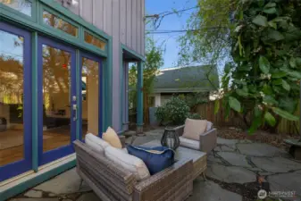 French doors go out to the patio space.