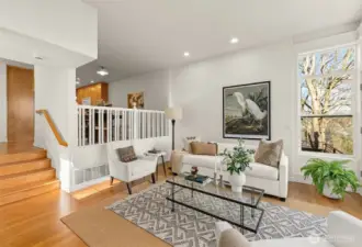 Spacious living room with 9 ft tall ceilings