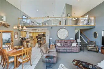 Great room, dining and kitchen with loft above