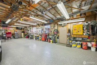 4+ car garage w/ 200-amp electrical service and plumbing for a bathroom.