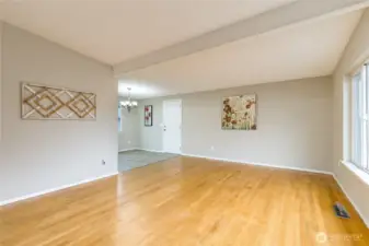 Bright living room with hardwood floors