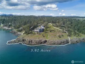 Rare point property encompassing 3.02± acres with approximately 640± feet of private shoreline, offering unmatched privacy and panoramic waterfront views on San Juan Island.