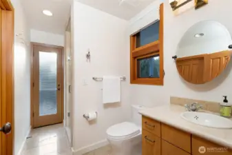 Well-appointed bathroom with quality finishes and clean design, providing both function and comfort for guests or everyday use.