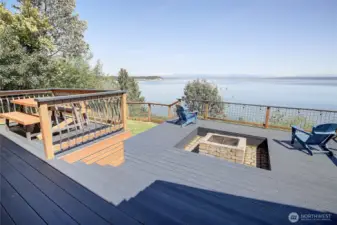 NEW Multi tiered deck w/covered spaces, outdoor dining, and firepit fun! Surrounded w/mountain + sound views, sunsets and the magic of salt water smells!  The perfect island lifestyle from this fully renovated home on Cavalero Road on Camano Island.