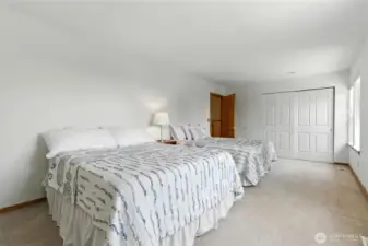 The first upstairs bedroom, extra-large size. Both bedrooms have beautiful Cascade Mountain views