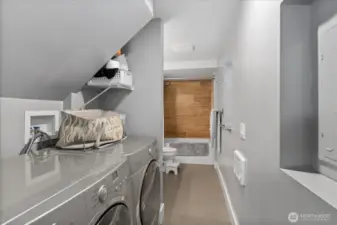 Laundry space located conveniently off the second bathroom.