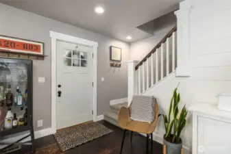 Front entry with stair to upper bedrooms.