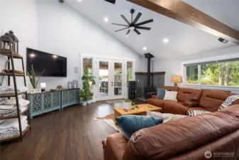 Wood stove makes this the perfect gathering space in fall and winter.