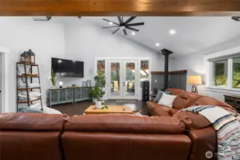 Rustic beams, LVP floors and ceiling fan grace this well thought-out space.