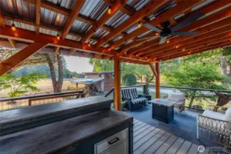 The perfect finishes to survive the out of doors experience; concrete countertops, trex decking, stainless appliances.