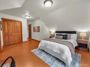 Bedroom or could be used as a bonus room.  It has a private bath to the left in this view.