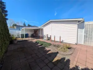 Low-maintenance back-yard for year-round enjoyment as part of the patio is covered!