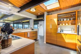 Spacious and efficient.  Notice the wood grain in the cabinets, they flow perfectly!