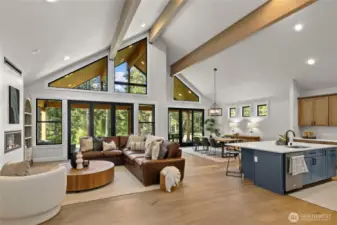 Open concept picturesque living room, dining and kitchen.