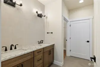 Primary Bedroom with walk in shower and closet. Mirrors to be installed soon.