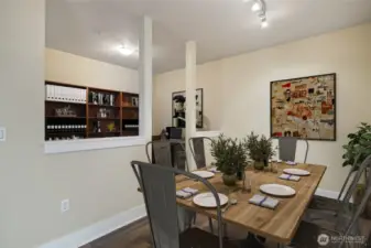 Second area off the living area could be a dining area as pictured or a library, virtually staged.