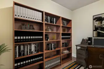 Staged as library second living area
