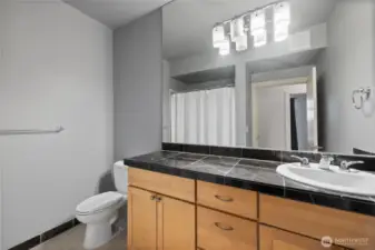 Bathroom has large vanity.