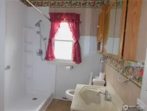 bathroom with newer large fiberglass shower stall