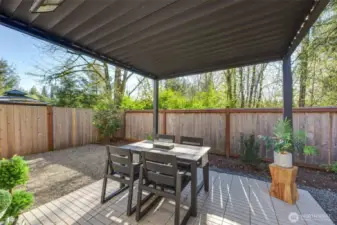 Great patio space complete with pergola.