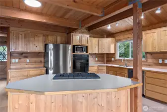 A very large island for ample counter space. All new appliances. Notice the beautiful exposed beams!