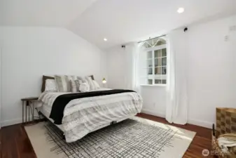 The carriage house features two comfortable bedrooms and a well-appointed full bathroom, providing privacy and comfort for everyone.