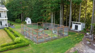The backyard is a fruitful paradise, featuring pear, apple, and elderberry trees, alongside a flourishing lavender garden at the rear of the main yard. Impress your guests with refreshing lavender lemonade made from syrup harvested right from your own lavender garden. Embrace a hobby farm lifestyle with a 10’ predator-proof fenced raised garden, perfect for growing your own fruits and vegetables. Expand the space with a chicken coop, goat run, or bee hives, and make use of the large shed and garden outbuilding—ideal for storage, potting, or projects. Enjoy daily visits from deer, elk, and more in a peaceful, private setting with no road noise, just the soothing sound of a distant creek. There's also plenty of room for RVs, boats, and all your outdoor gear.
