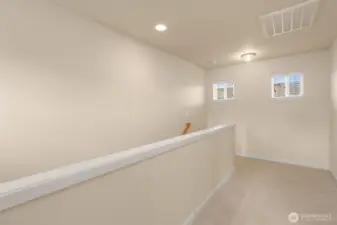Love the width of the hallway leading to the loft space for your desk
