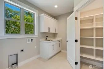 Laundry with walk-in pantry