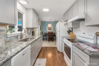 Kitchen leads to dining room