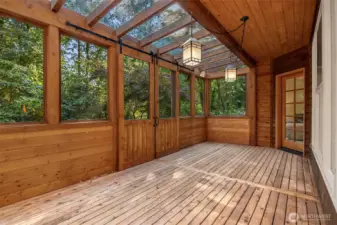 Large, covered porch / sun room. Terrific for entertaining year round.
