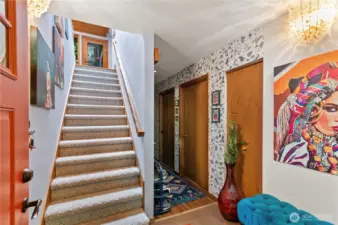 Entry, Kitchen, primary and additional bedroom upstairs.