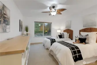 Secondary primary bedroom front - staged - with built in storage