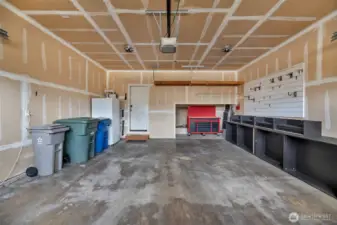 2 car garage with 2 EV chargers and tankless hot water heater